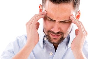 Man with TMJ Headache