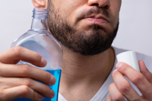 Man with Mouthwash
