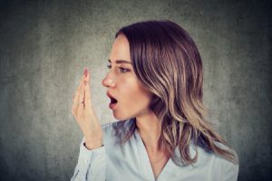 Woman Checking for Bad Breath